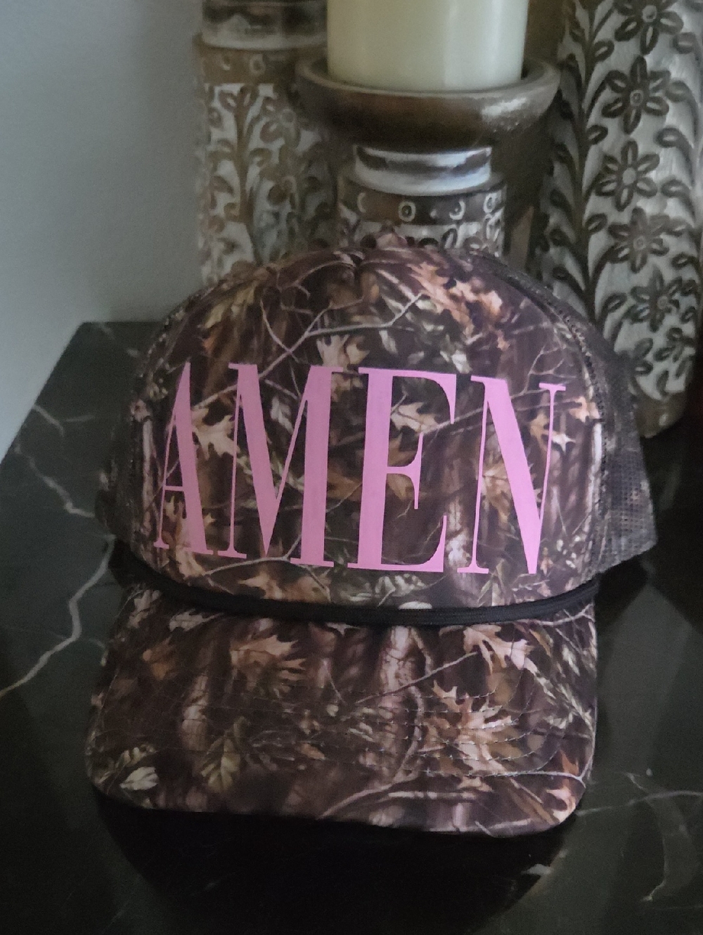 Camo Trucker Hat with Pink AMEN Graphic